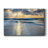 Tranquil Shoreline: Serene Ocean Waves Under a Dramatic Cloudscape