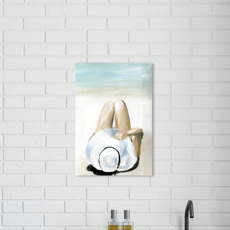 Serene Coastal Escape: Relaxing Woman with Hat Art Print