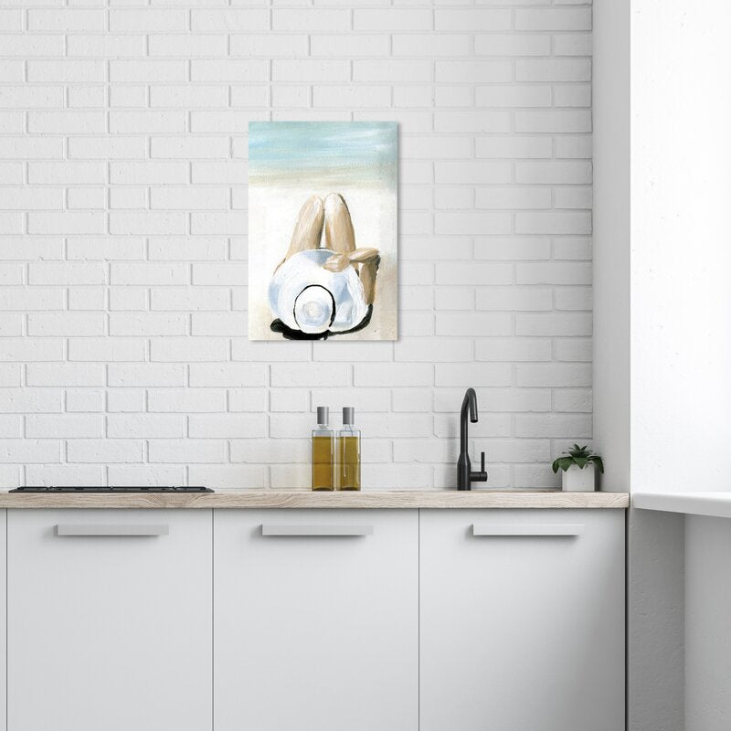 Serene Coastal Escape: Relaxing Woman with Hat Art Print