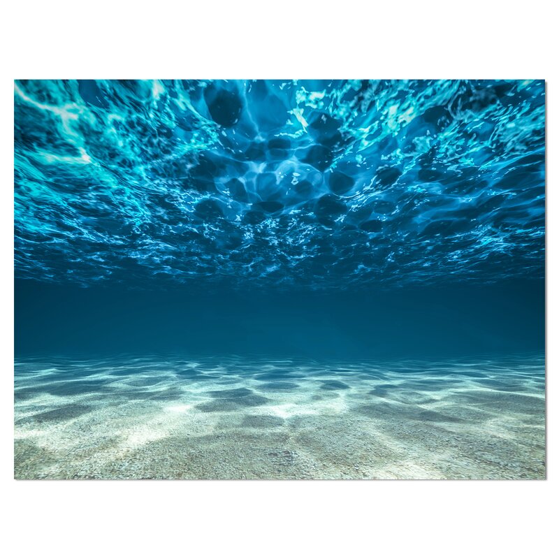 Tranquil Underwater Scene with Crystal Clear Waves and Soft Sandy Bottom