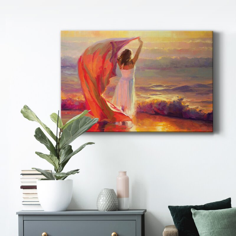 Serene Ocean Sunset: Woman with Flowing Fabric by the Sea