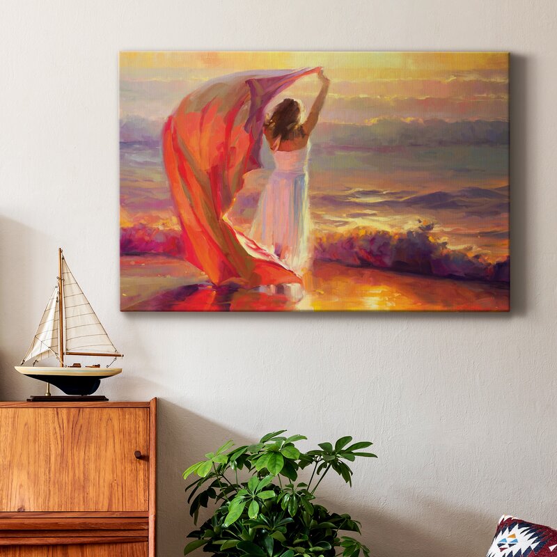 Serene Ocean Sunset: Woman with Flowing Fabric by the Sea