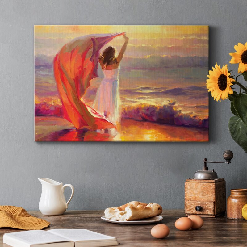 Serene Ocean Sunset: Woman with Flowing Fabric by the Sea