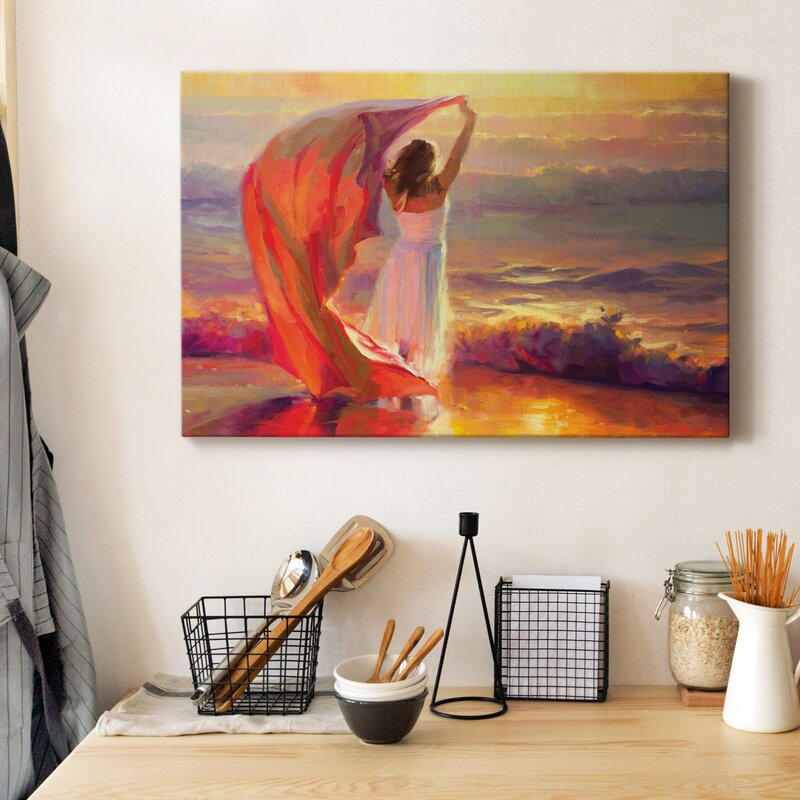 Serene Ocean Sunset: Woman with Flowing Fabric by the Sea