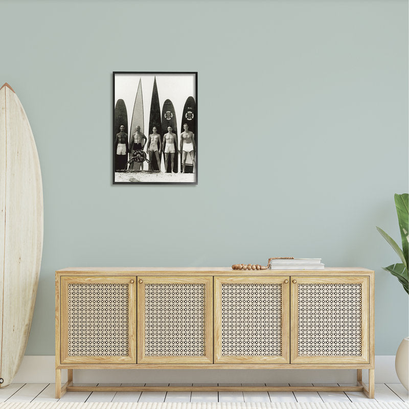 Classic Surfing Scene: Vintage Men with Surfboards in Black and White