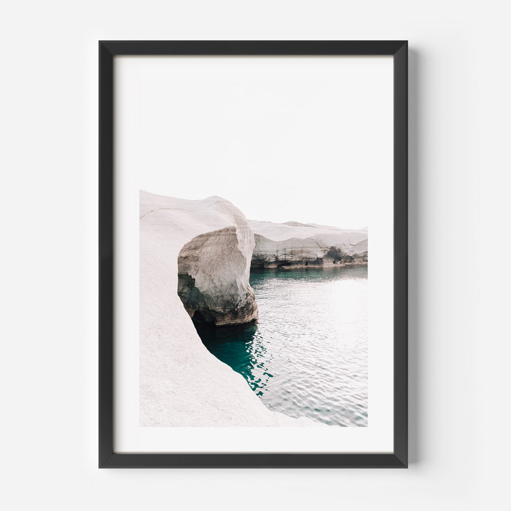 Serene Coastal Landscape: Vibrant Azure Waters and Majestic Stone Formations