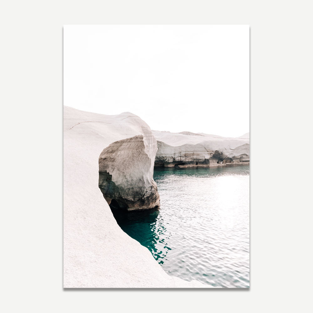Serene Coastal Landscape: Vibrant Azure Waters and Majestic Stone Formations