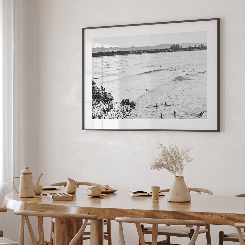 Serene Ocean Waves with Surfers in Black and White Art Print