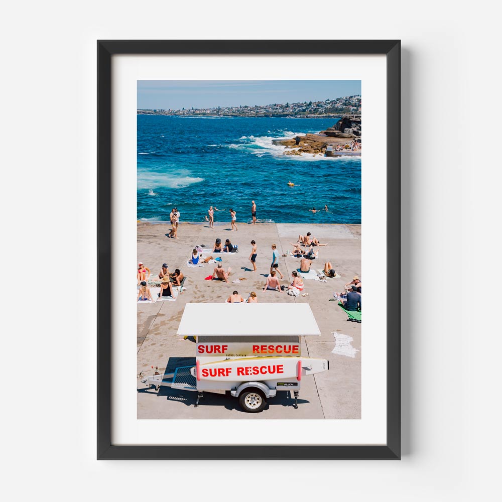 Vibrant Beach Scene with Surf Rescue at Sunny Shoreline