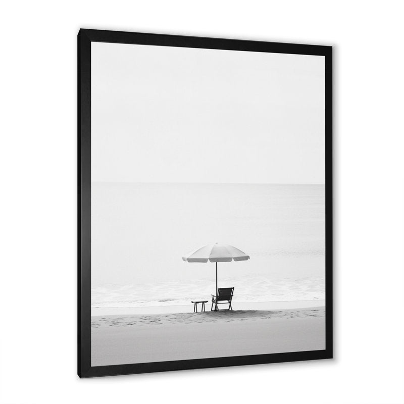 Serene Black and White Minimalism Beach Scene with Umbrella and Chair