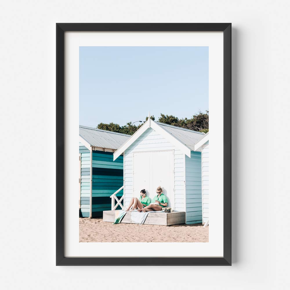 Summer Serenity at Brighton Beach with Colorful Bathing Huts and Relaxing Bathers