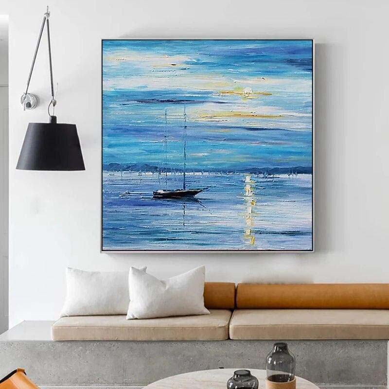 Tranquil Sailboat Journey Across Serene Ocean Waves in Blue Hue