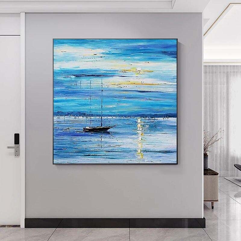 Tranquil Sailboat Journey Across Serene Ocean Waves in Blue Hue