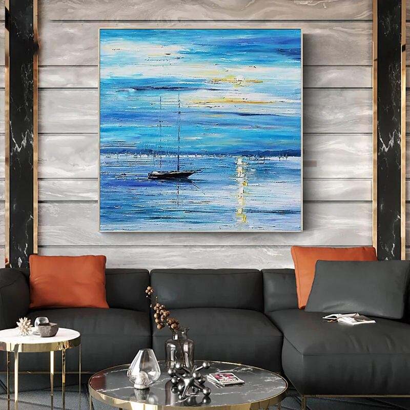 Tranquil Sailboat Journey Across Serene Ocean Waves in Blue Hue