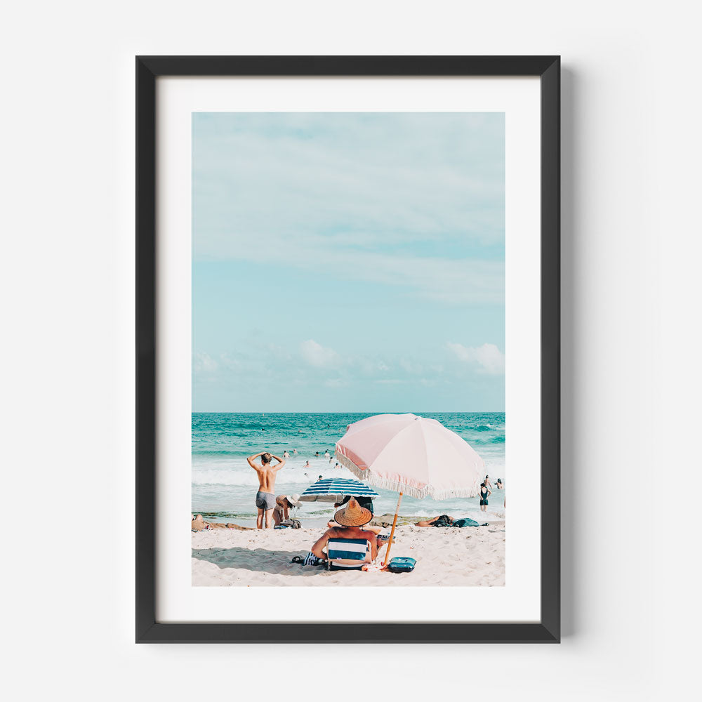 Sunny Day at Maroubra Beach - Relaxing Bathers Under Pink Umbrella