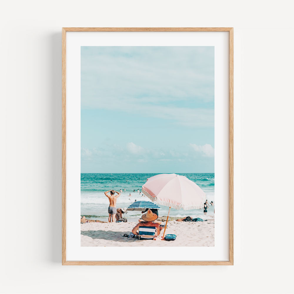 Sunny Day at Maroubra Beach - Relaxing Bathers Under Pink Umbrella