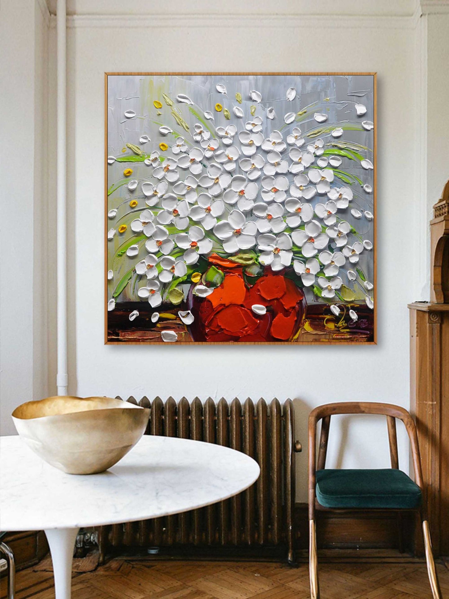 Vibrant Floral Still Life with White Flowers in a Bold Orange Vase