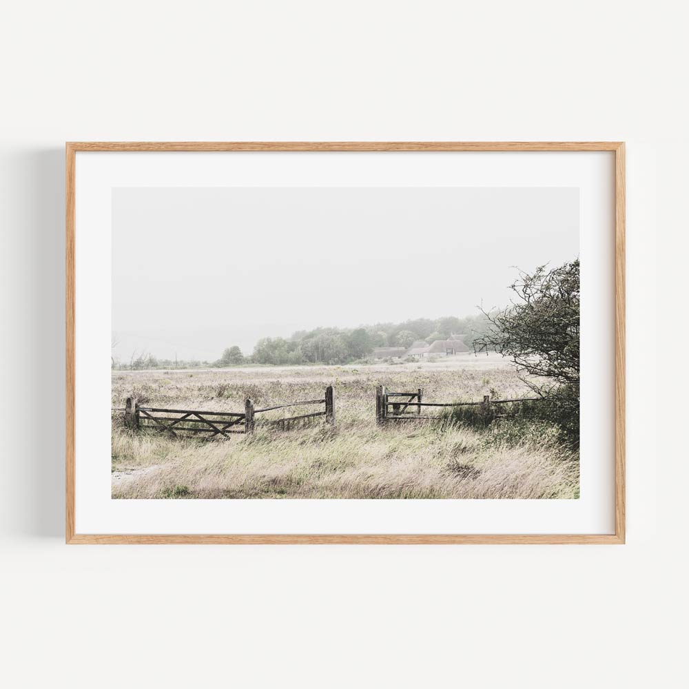 Serene Landscape with Open Gate and Lush Green Meadows in Soft Pastel Tones