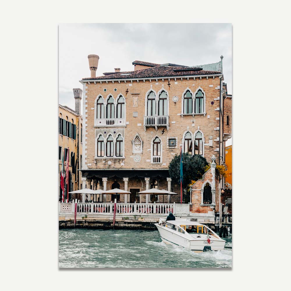 Charming Venetian Waterfront with Boat and Historic Architecture
