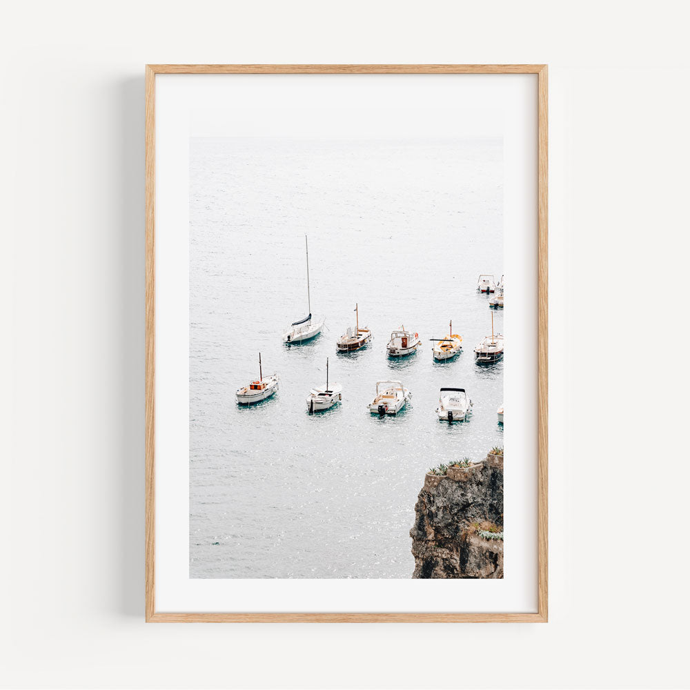Amalfi Coast Serenity: Charming Boats on Tranquil Waters