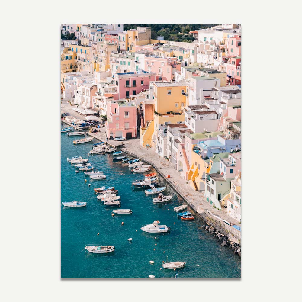 Vibrant Coastal Scene of Procida with Colorful Houses and Boats on Blue Water