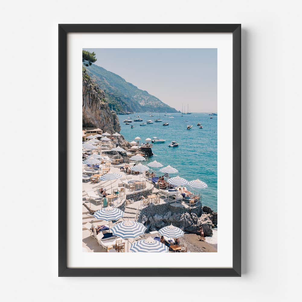 Coastal Serenity: Vibrant Ocean View with Beach Umbrellas and Warm Summer Vibes
