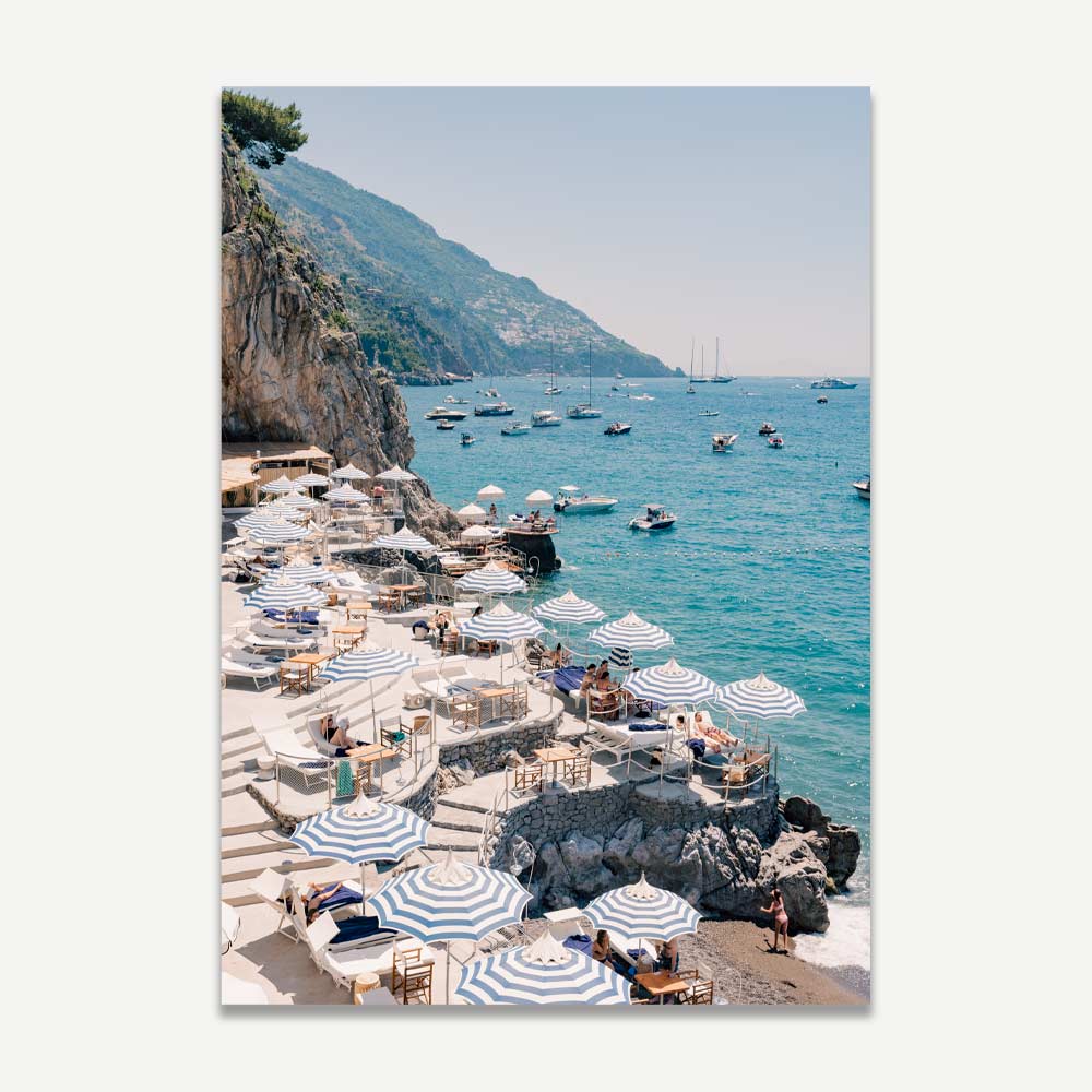 Coastal Serenity: Vibrant Ocean View with Beach Umbrellas and Warm Summer Vibes