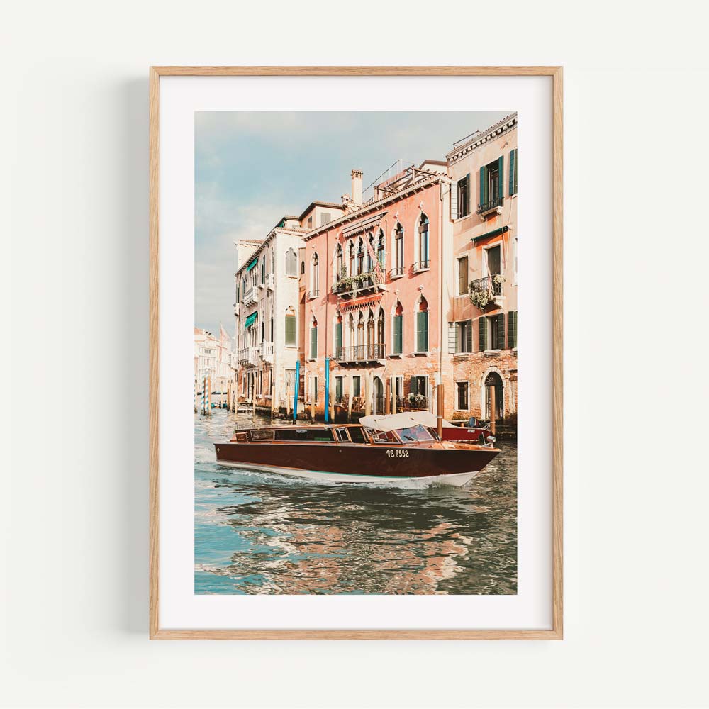 Venetian Waterway Serenity: Charming Boat on Canals with Historic Buildings