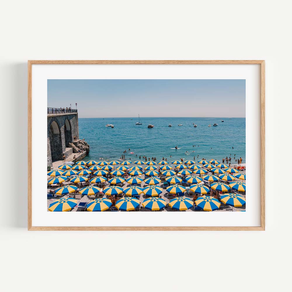 Vibrant Beach Scene with Colorful Umbrellas and Serene Ocean View
