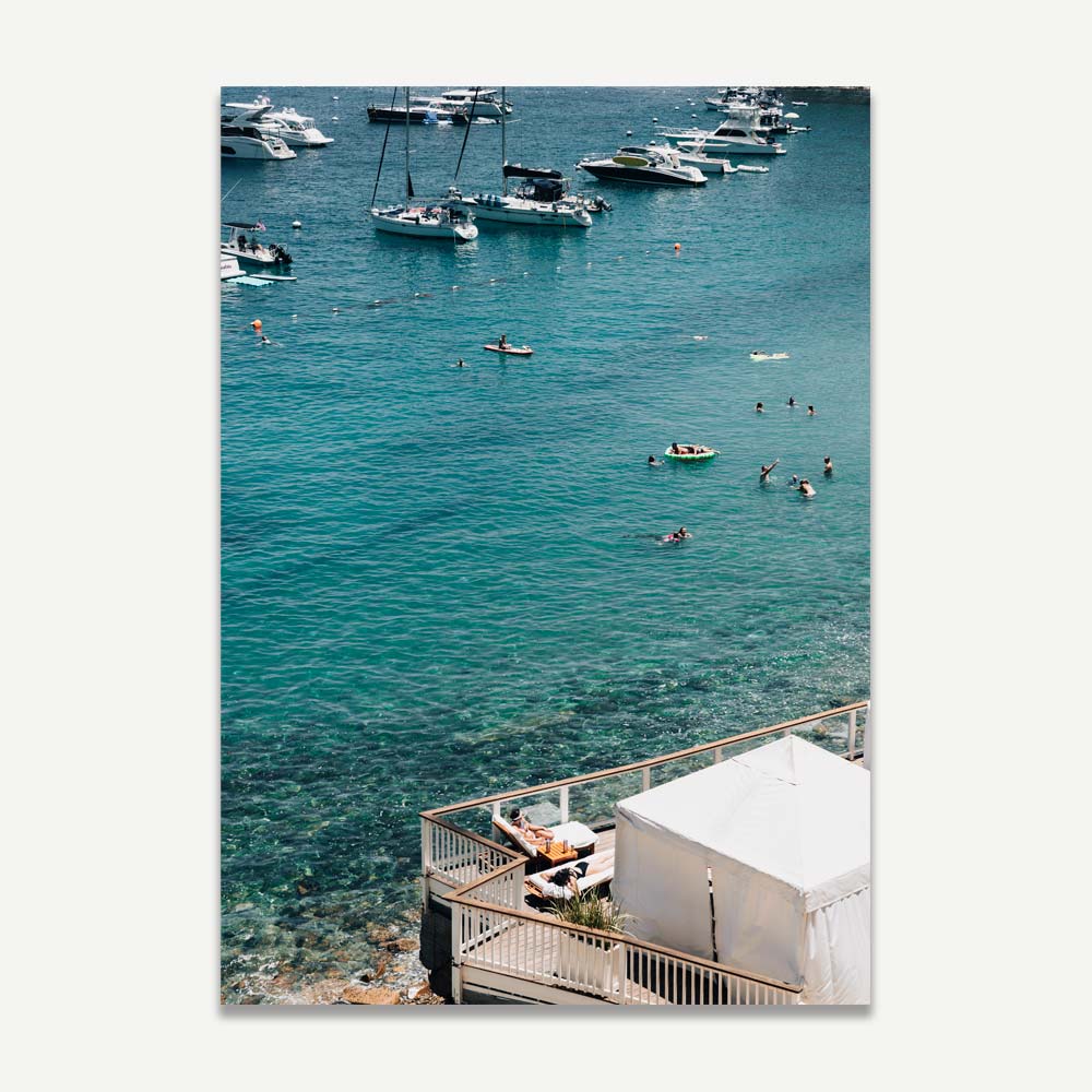 Serene Catalina Beach Scene with Bathers and Moored Boats