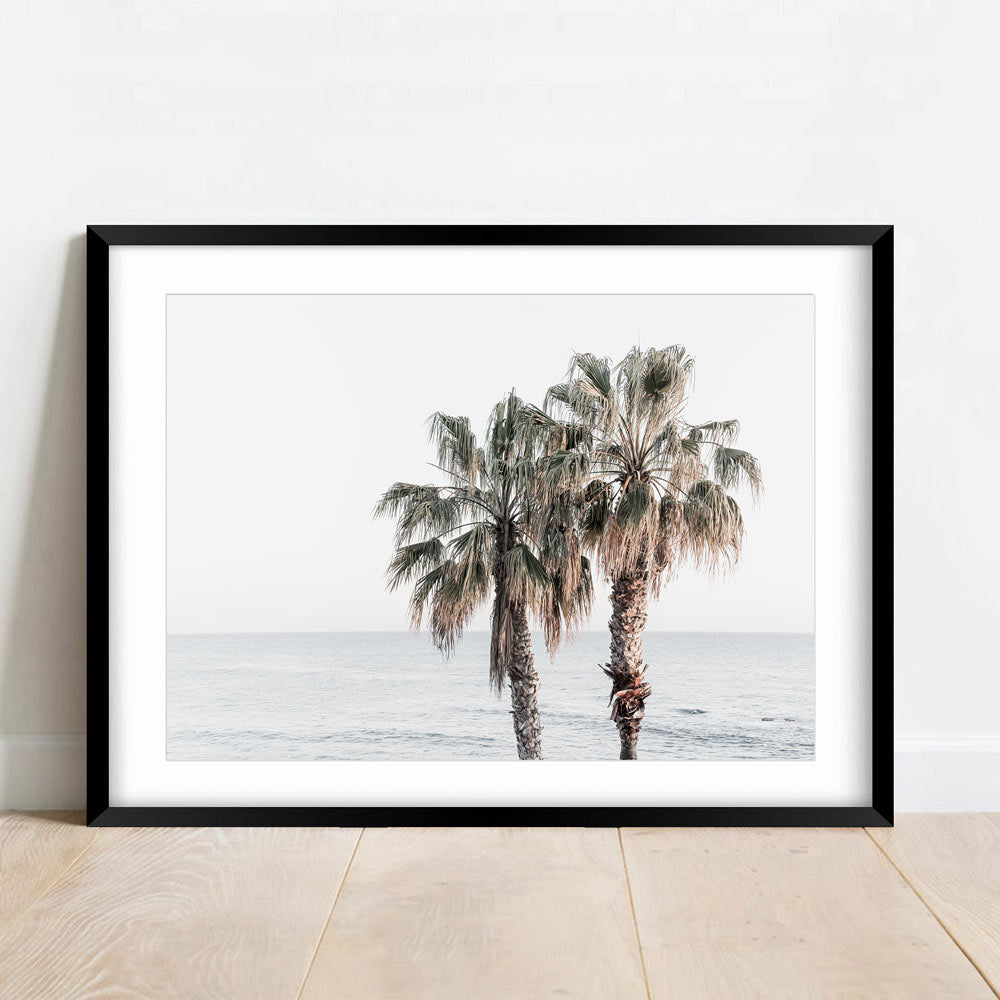 Coastal Serenity: Palm Trees by the Ocean in Soft Ocean Hues