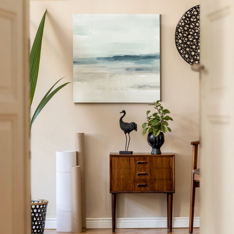 Serene Coastal Horizon in Soft Blue and Cream Tones