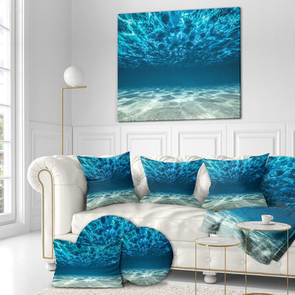 Tranquil Underwater Scene with Crystal Clear Waves and Soft Sandy Bottom