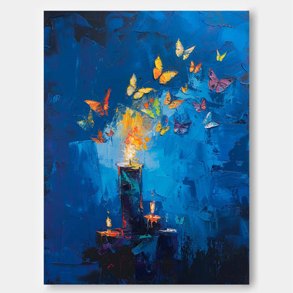 Vibrant Abstract Oil Painting with Candles and Butterflies on Deep Blue Canvas