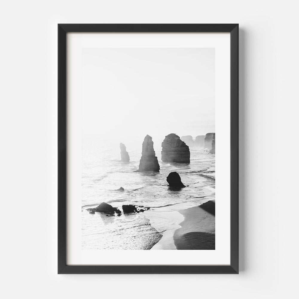 Serene Seascape: Black and White Coastal Rock Formation Art