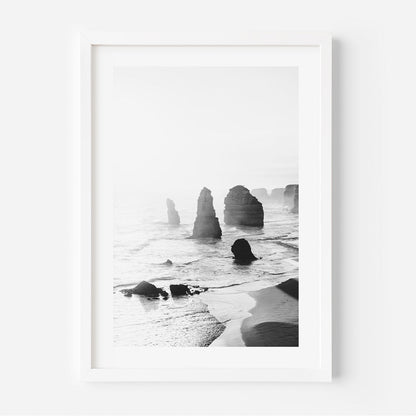 Serene Seascape: Black and White Coastal Rock Formation Art