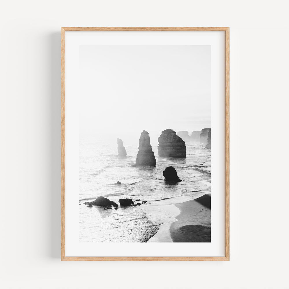 Serene Seascape: Black and White Coastal Rock Formation Art