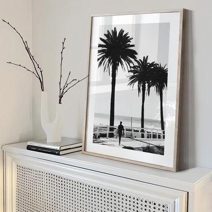 Serene Black and White Surfer Art with Palm Trees by the Ocean