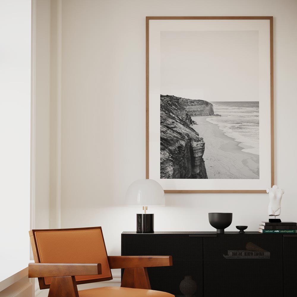 Serene Coastal Cliffscape in Elegant Black and White Oil Painting