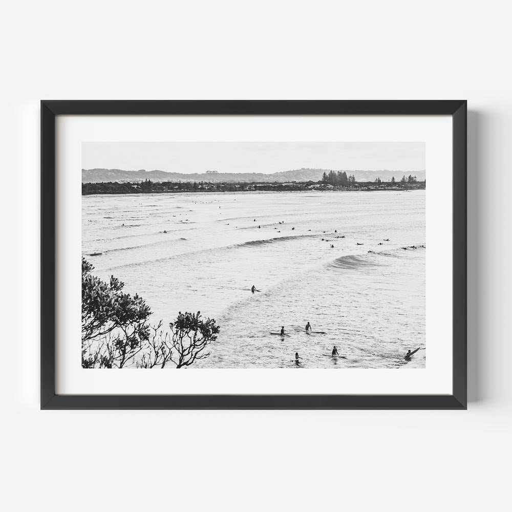Serene Ocean Waves with Surfers in Black and White Art Print