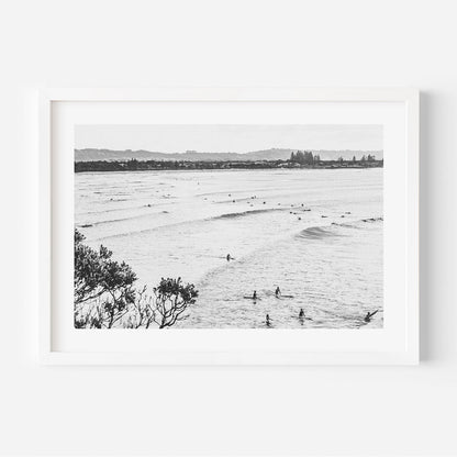 Serene Ocean Waves with Surfers in Black and White Art Print