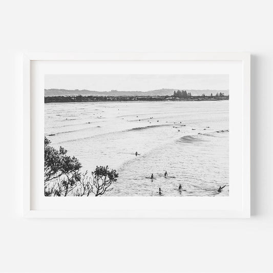 Serene Ocean Waves with Surfers in Black and White Art Print