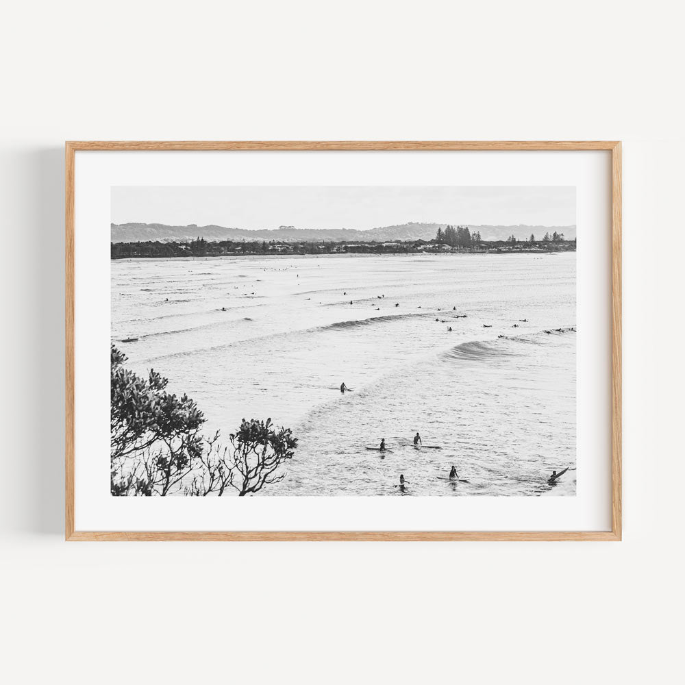 Serene Ocean Waves with Surfers in Black and White Art Print