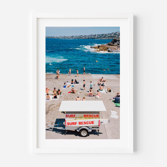 Vibrant Beach Scene with Surf Rescue at Sunny Shoreline