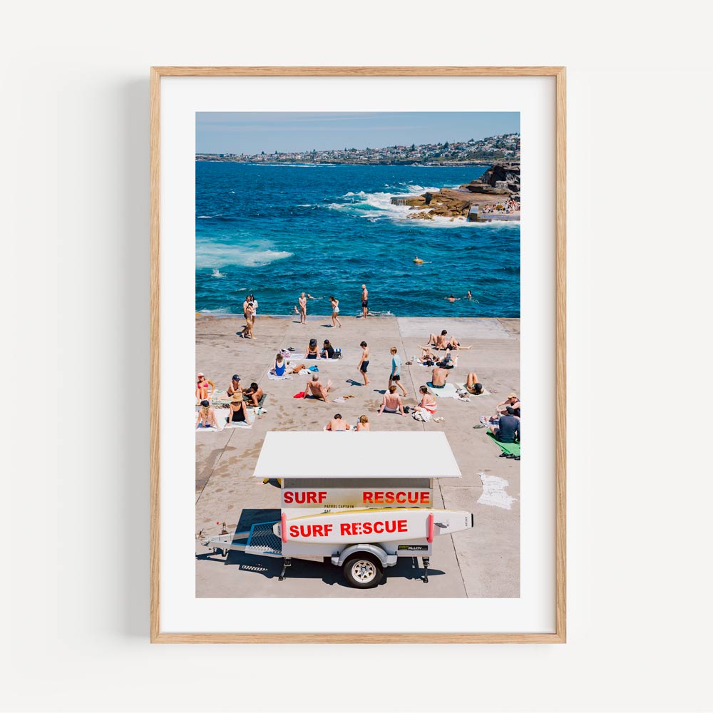 Vibrant Beach Scene with Surf Rescue at Sunny Shoreline