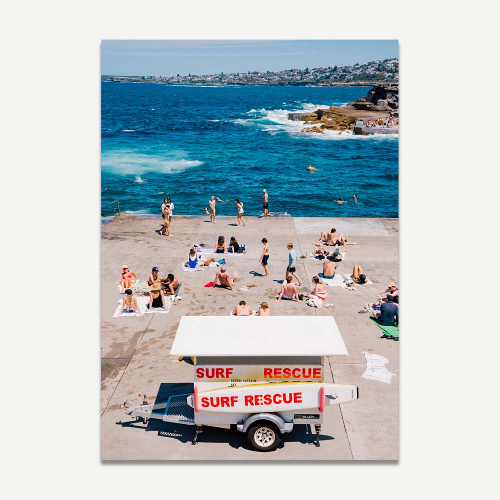 Vibrant Beach Scene with Surf Rescue at Sunny Shoreline