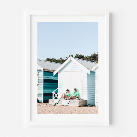 Summer Serenity at Brighton Beach with Colorful Bathing Huts and Relaxing Bathers