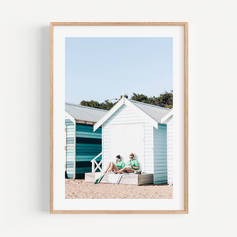 Summer Serenity at Brighton Beach with Colorful Bathing Huts and Relaxing Bathers