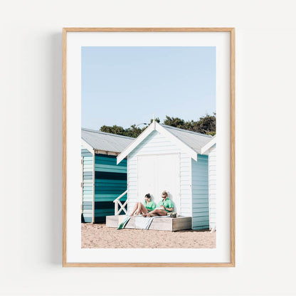 Summer Serenity at Brighton Beach with Colorful Bathing Huts and Relaxing Bathers