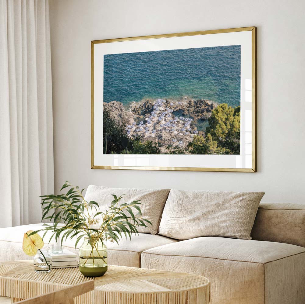 Serene Capri Beach Scene with Coastal Umbrellas and Azure Waters